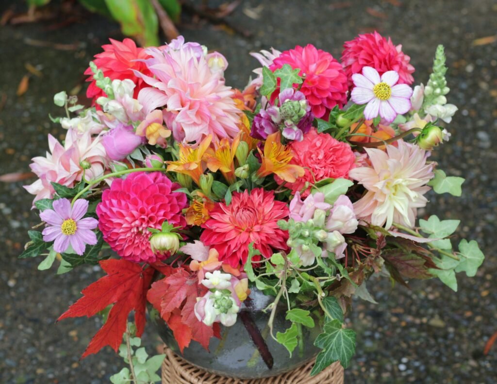 Vibrant fresh flower bouquet with roses, daisies, and wild blooms