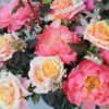 Luxury fresh flower arrangement coral peach burgundy tones