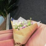 Soft pastel Valentine’s Day flower arrangement featuring blush, cream, and romantic seasonal blooms—an elegant gift to celebrate love.