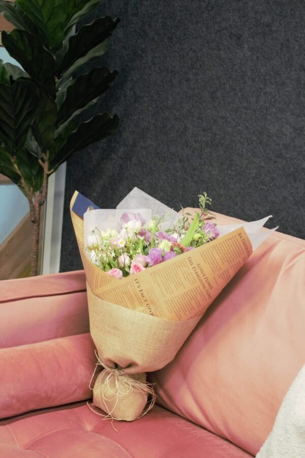 Soft pastel Valentine’s Day flower arrangement featuring blush, cream, and romantic seasonal blooms—an elegant gift to celebrate love.