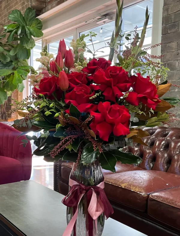 Florist’s choice red flower bouquet, perfect for Valentine’s Day, handcrafted by a North Strathfield florist for local deliveries.