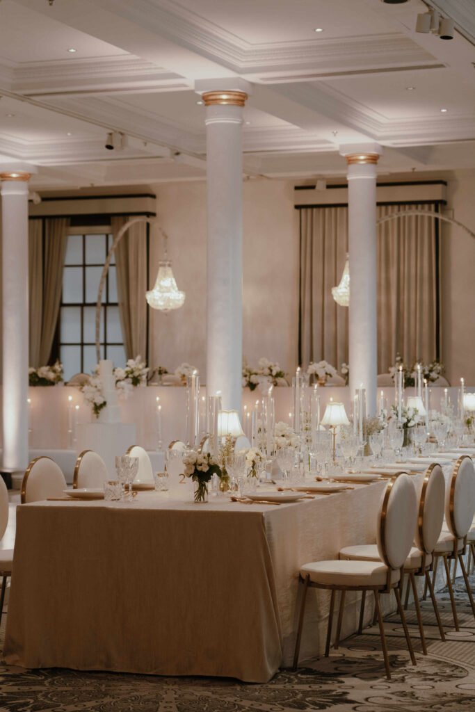 Elegant wedding reception table flowers with candles and classic styling Sydney