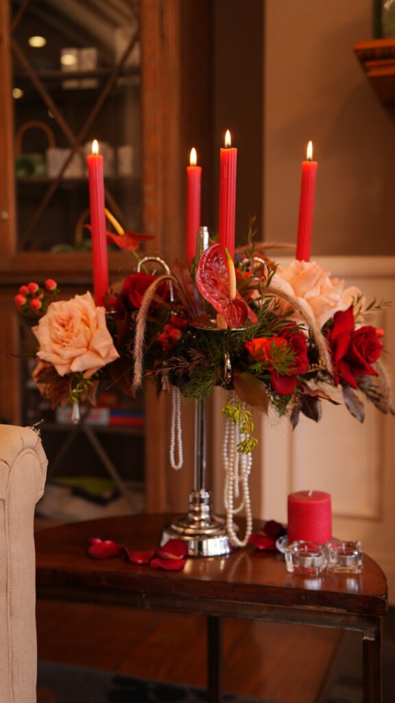 Romantic wedding reception table flowers with candlelight and garden-inspired floral styling in Sydney